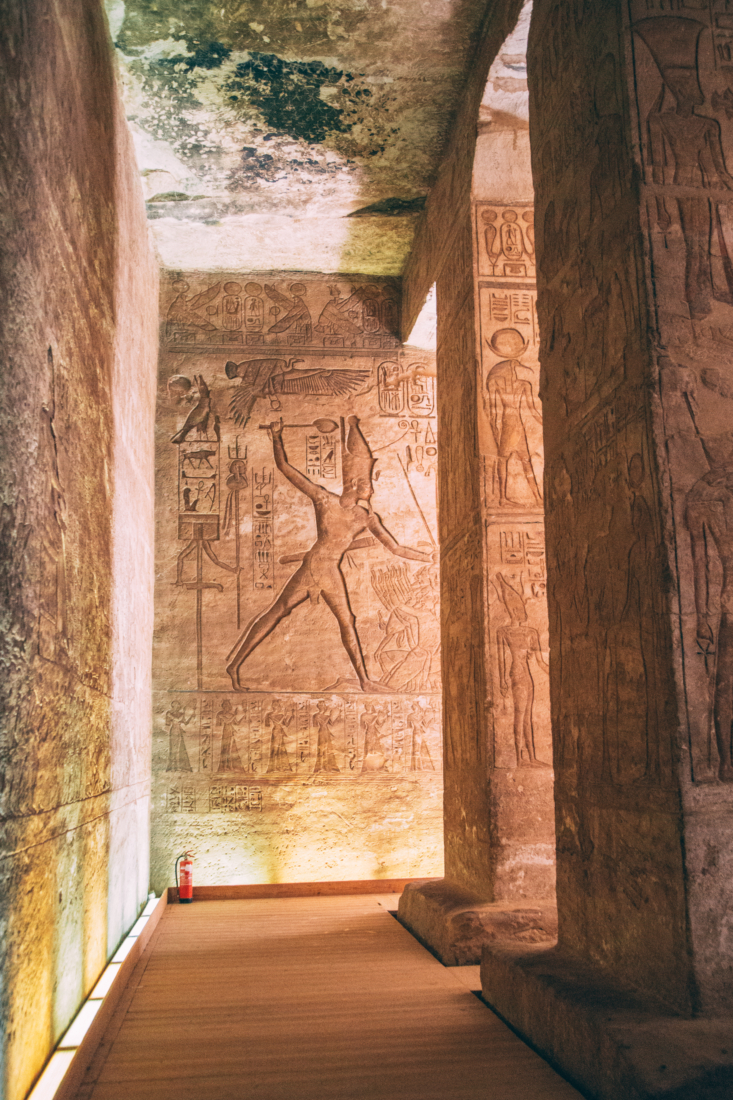 The inside of Abu Simbel featuring large stone carvings