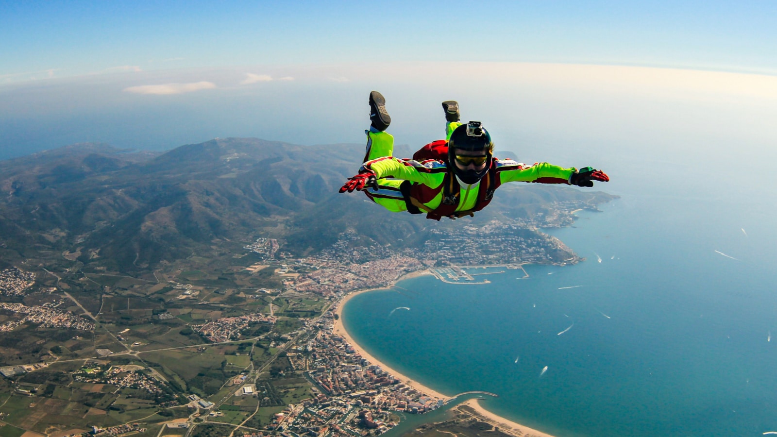 Sea skydive background. Man jumps with parashute