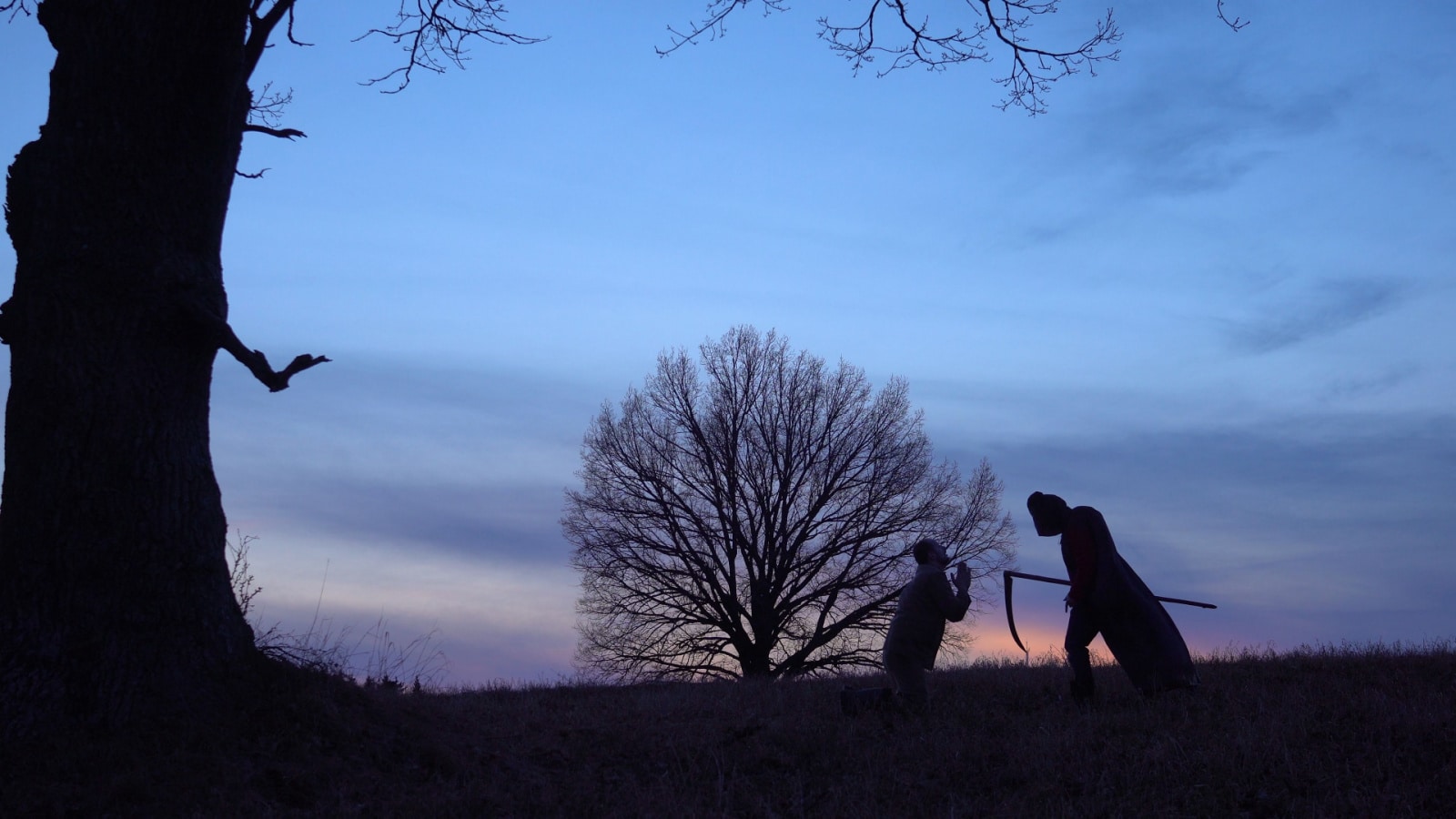 Grim Reaper came for a new victim and leads the victim to death. And the man begs for mercy. sunset silhouette. concept of death and the struggle for life