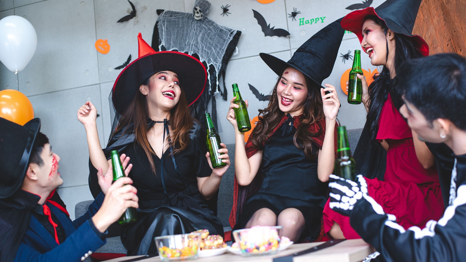 A group of Asian men dressed in fantasy-themed Halloween party to celebrate your average fun.