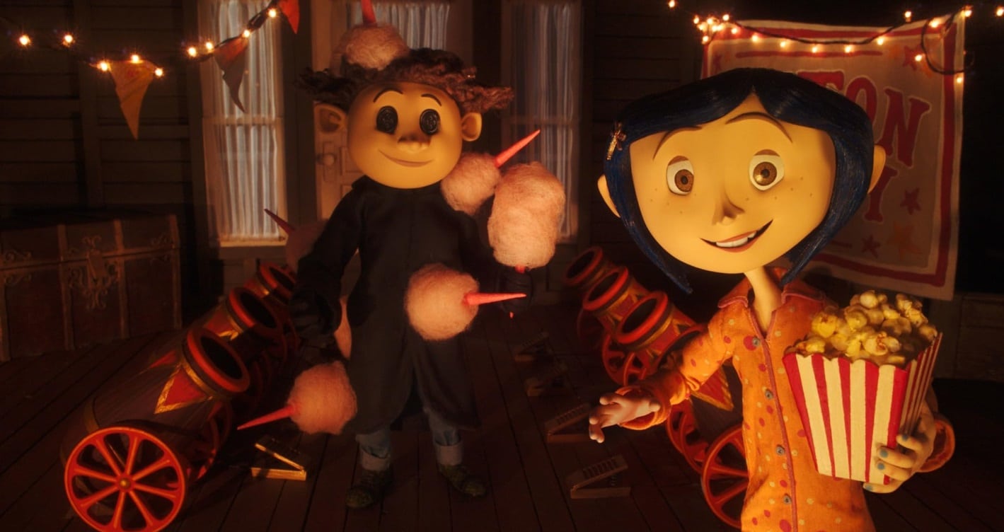 Robert Bailey Jr. and Dakota Fanning in Coraline (2009)