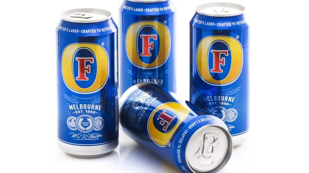 SWINDON, UK -FEBRUARY 20, 2015: Four Cans of Foster's Lager of a White Background