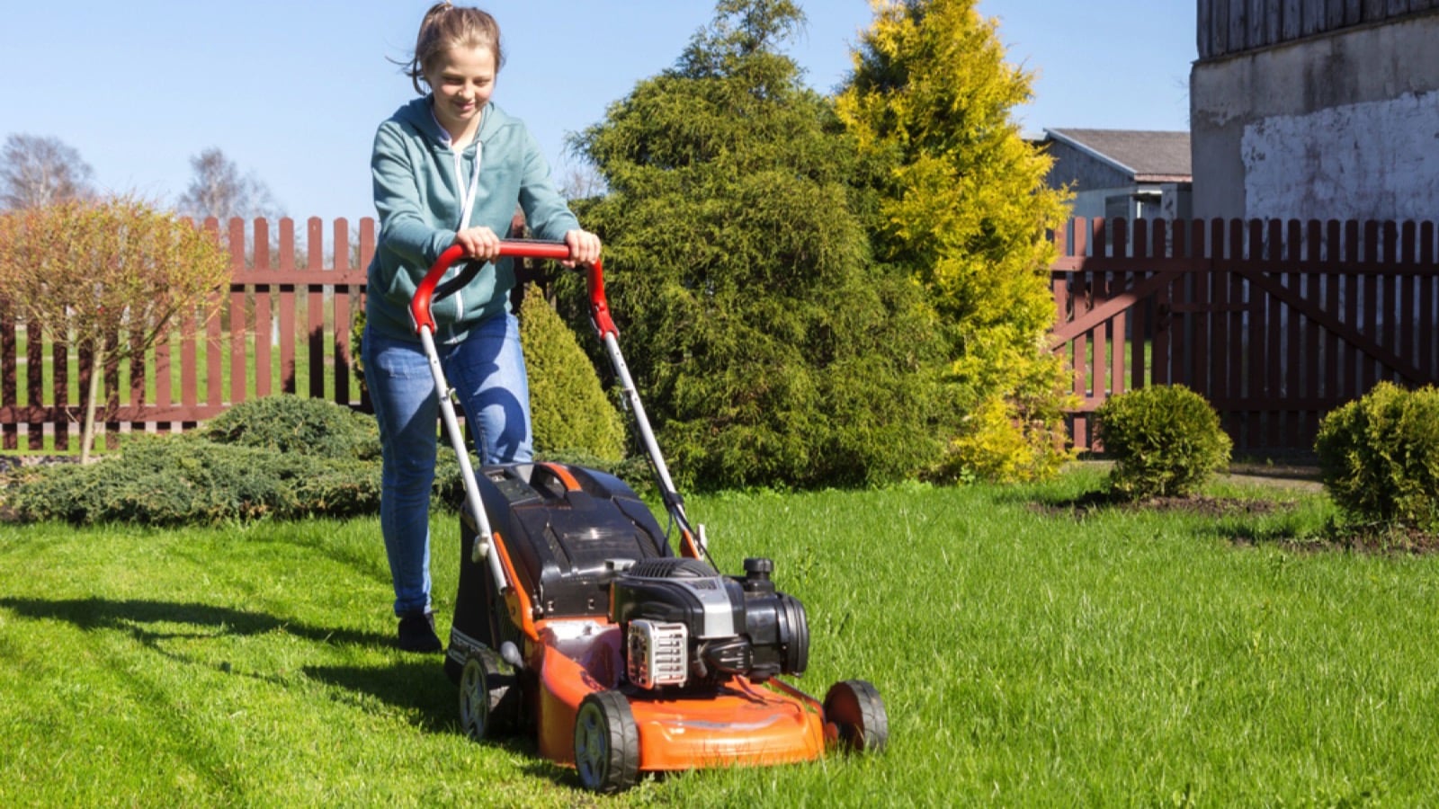 Teen lawn mowing