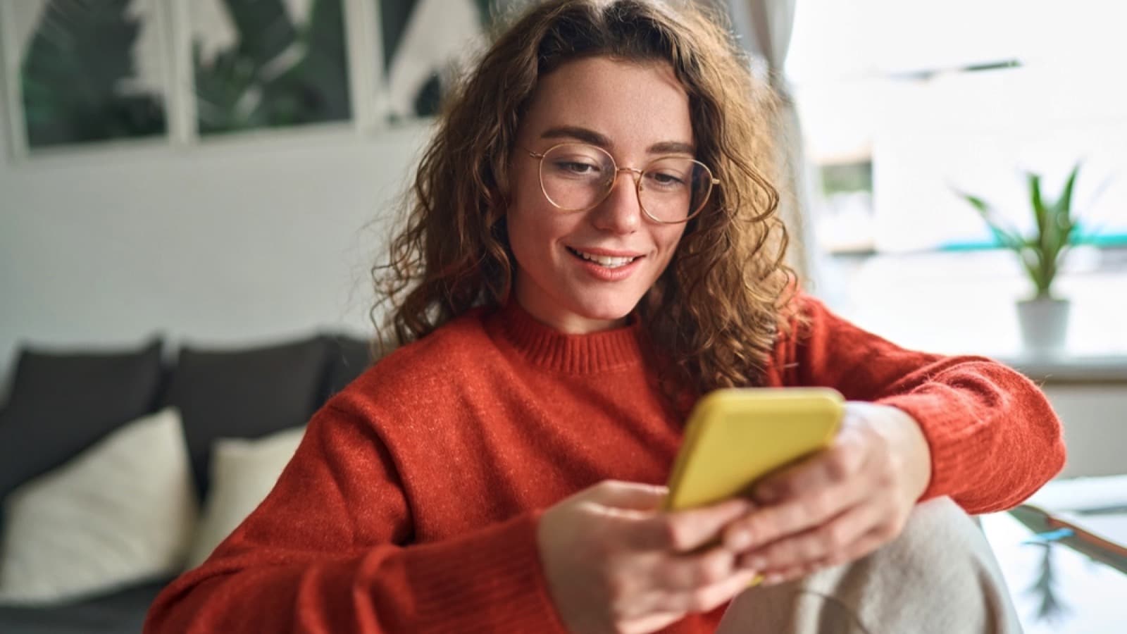 Woman using mobile for shopping