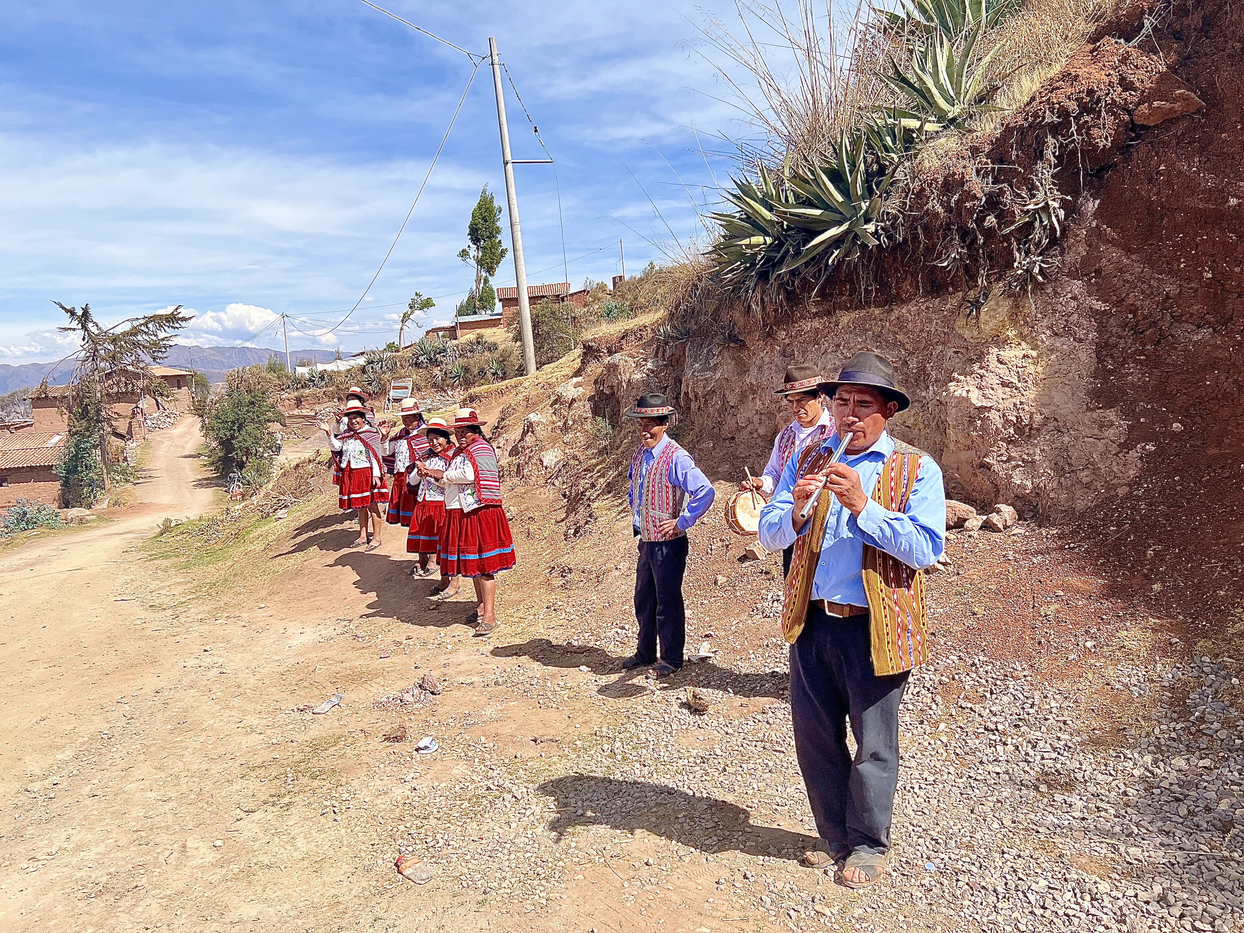 The Misminay Community members playing instruments