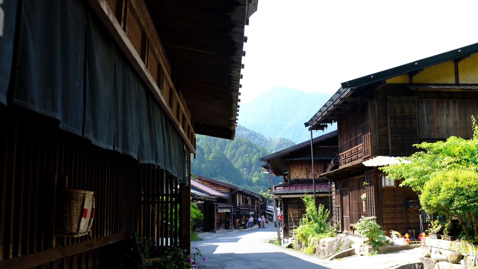 Tsumago-juku, Nakasendo trail, Kiso Valley, Nagano, Gifu, Japan - June 2019 : Entrance to the quaint small village of Tsumago on the historical Nakasendo trail in Kiso Valley, Nagano, Gifu, Japan.