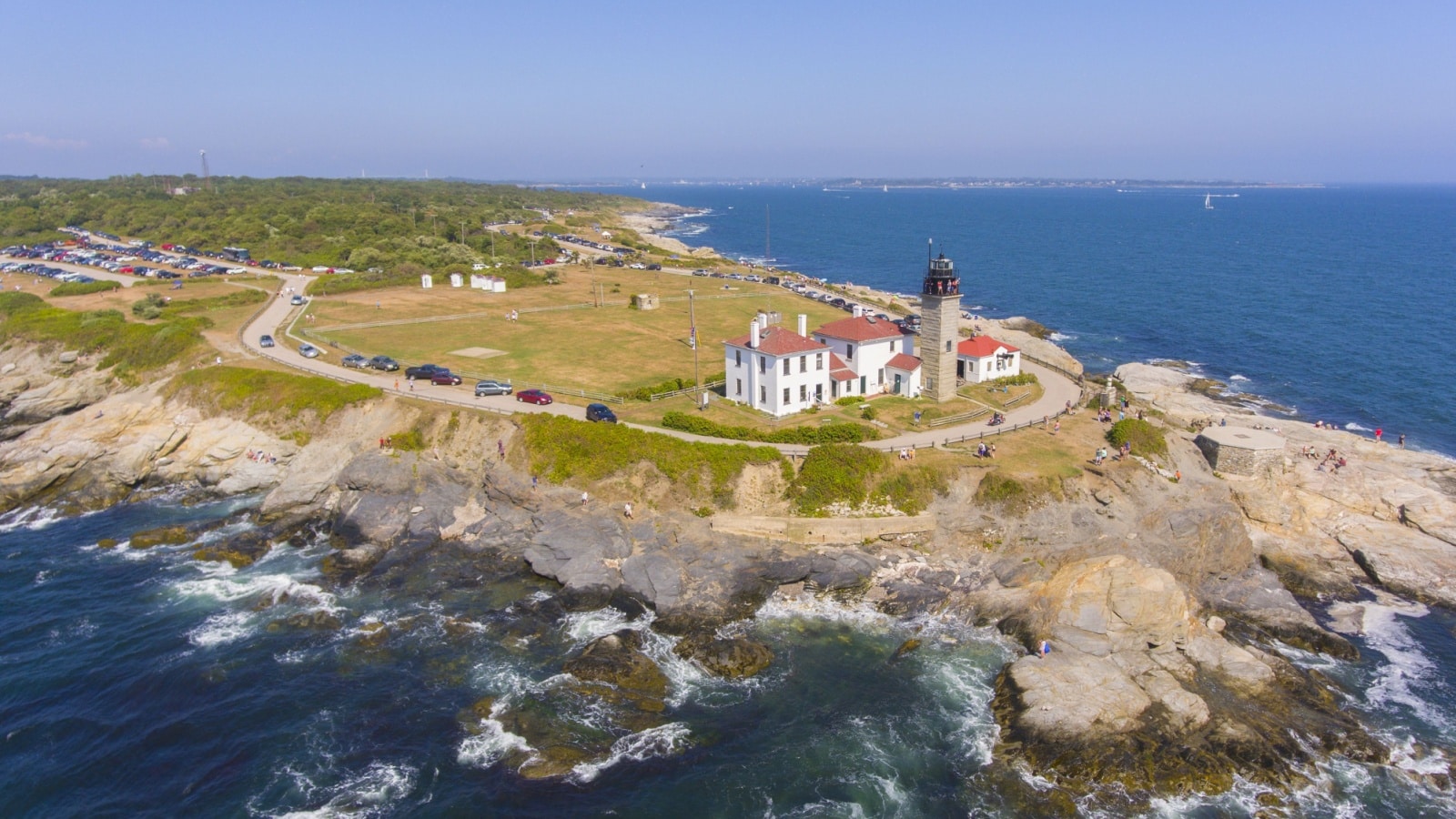 Beavertail Lighthouse in Beavertail State Park aerial view in summer, Jamestown, Rhode Island RI, USA. This lighthouse, built in 1856, at the entrance to Narragansett Bay on Conanicut Island.