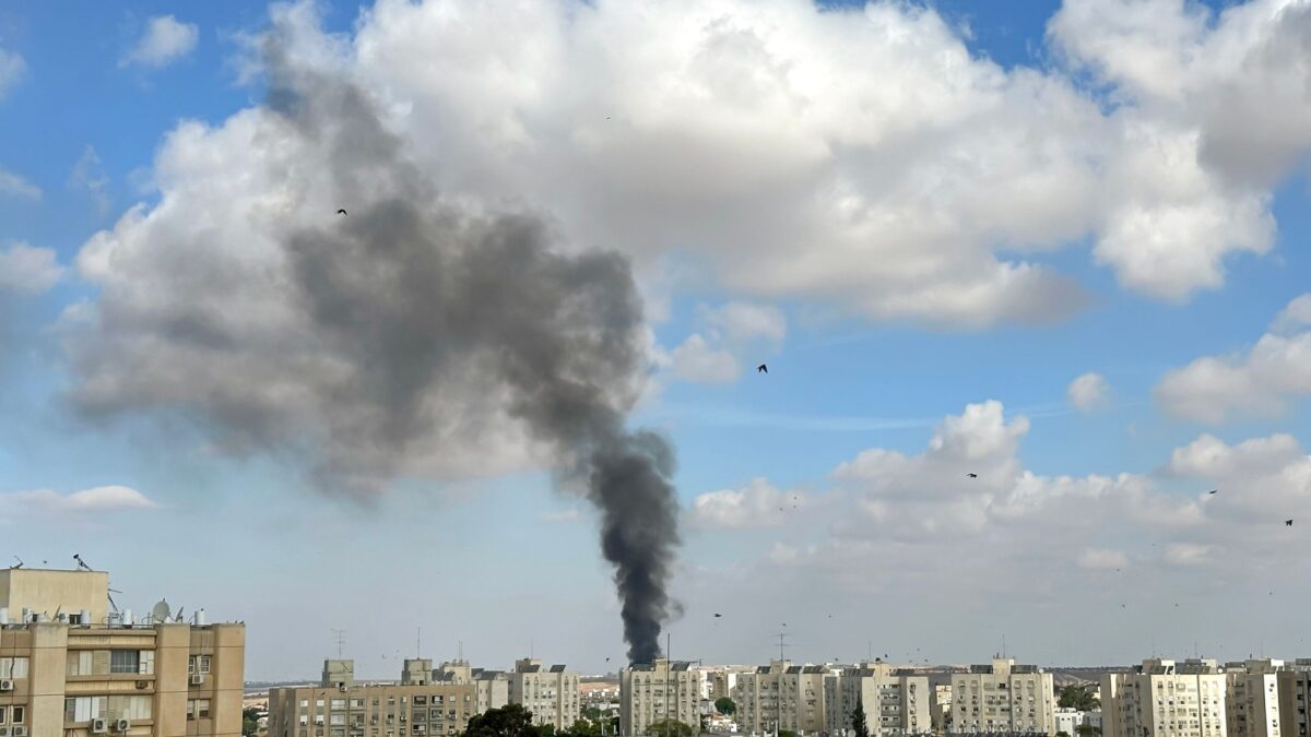 BEER SHEVA, ISRAEL - OCTOBER 07, 2023: A column of smoke at the site of a fallen Hamas rocket from the Gaza Strip