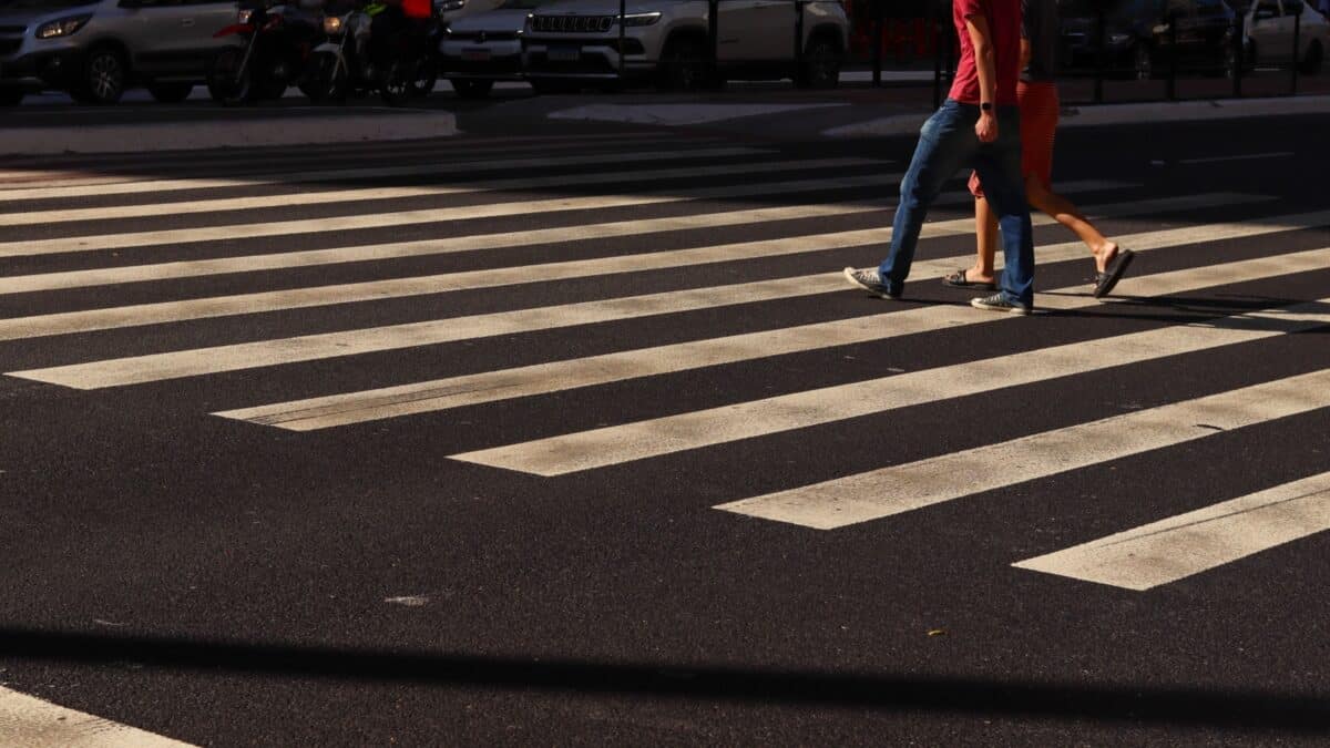 Pedestrians crossing a crosswalk in brazil