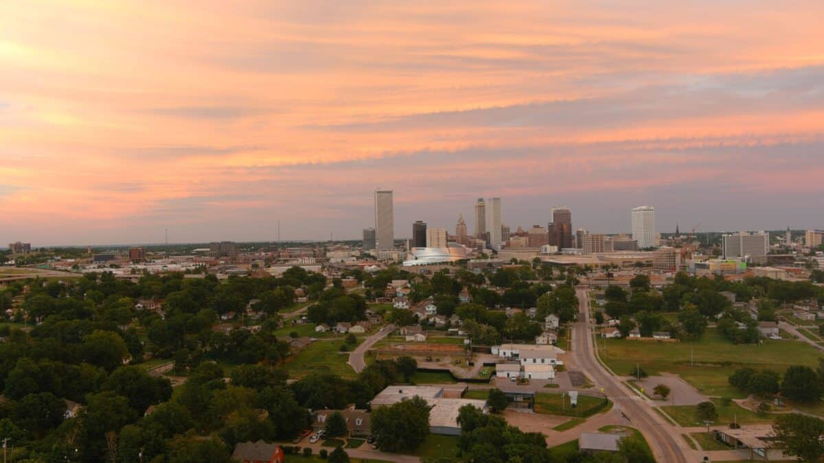 Wide Tulsa skyline at sunset.