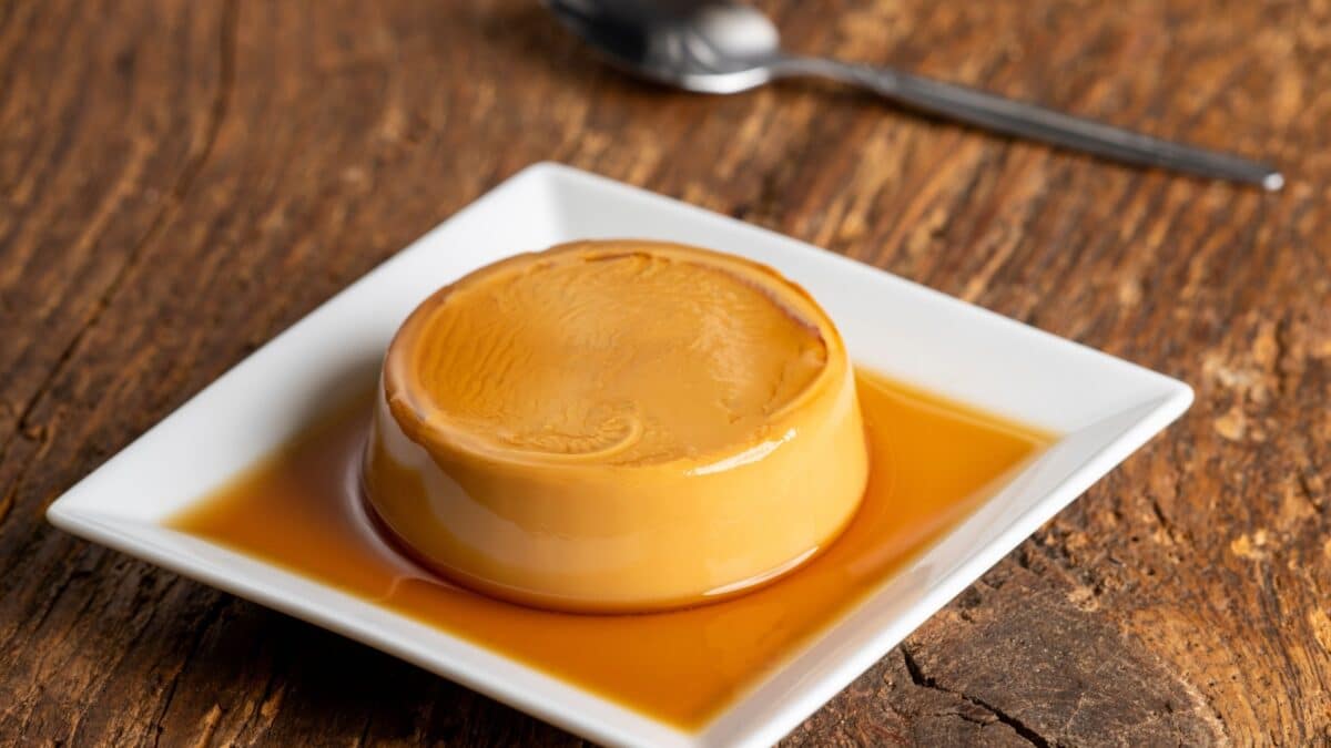 french flan on dark wood