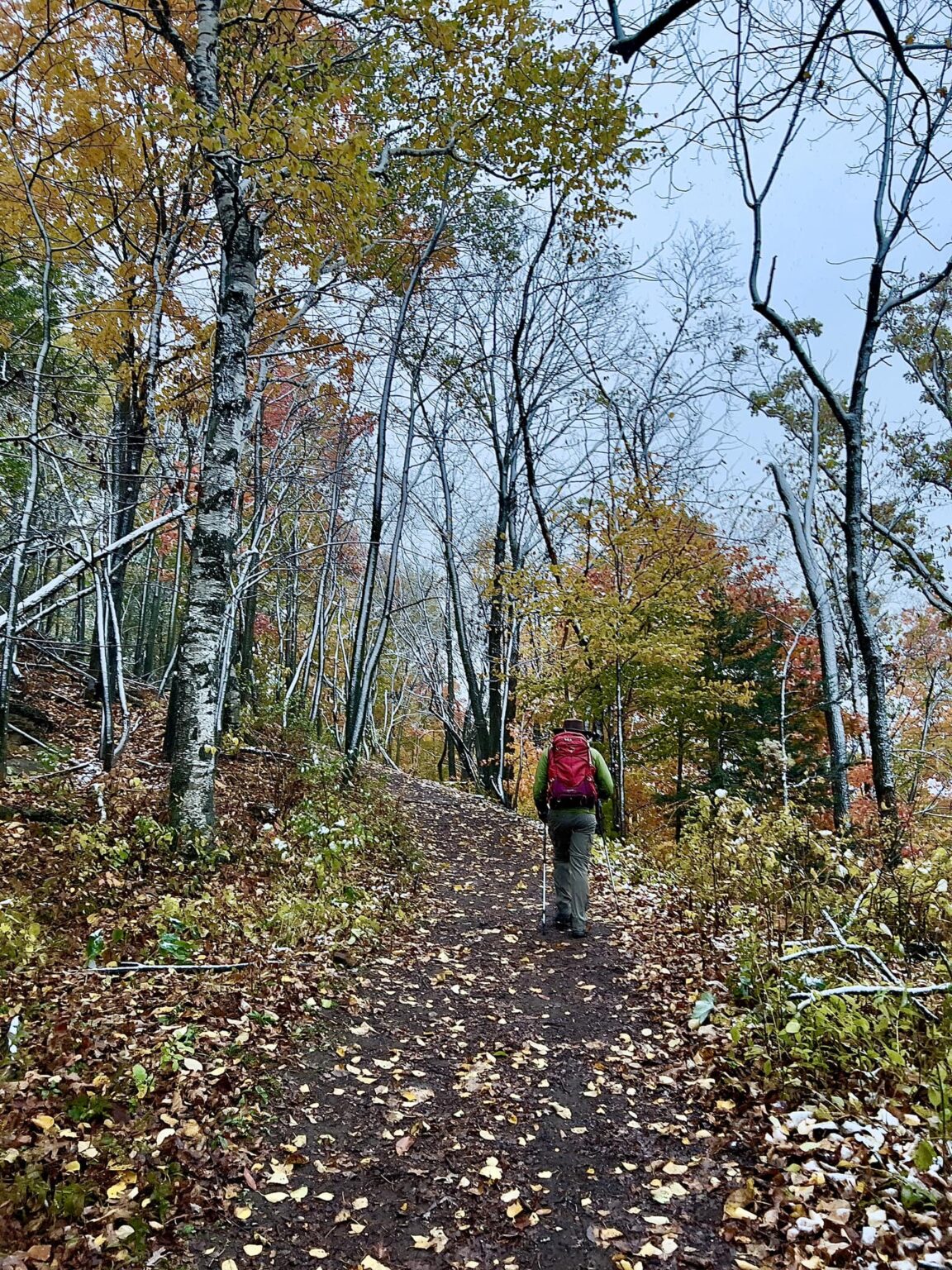 Zac walking up Mosquito Hill in Wisconsin with his hiking gear for the Inca Trail