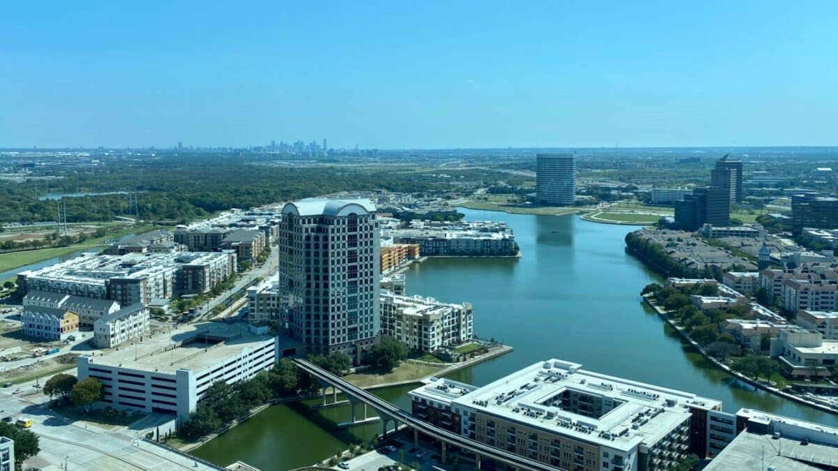 Irving, TX / USA - October 10 2020: The apartments, hotels and shopping surround the business district of Las Colinas in Irving Texas