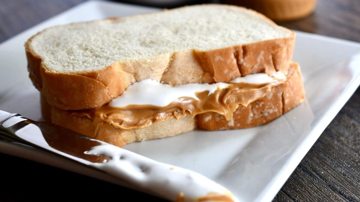 Fluffernutter sandwich on a white plate