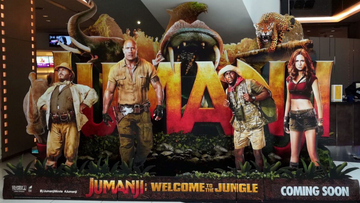 KUALA LUMPUR, MALAYSIA on 14 December 2017 - Standee of Jumanji: Welcome to the Jungle display at the cinema to promote the show. It is a 2017 American action adventure comedy film