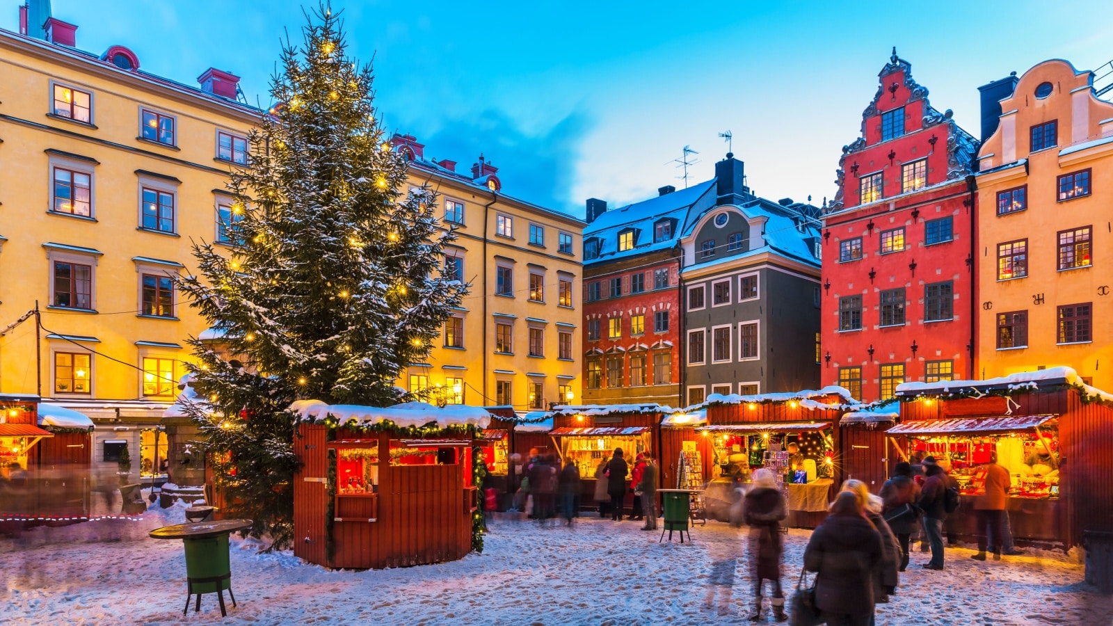 Beautiful snowy winter scenery of Christmas holiday fair at the Big Square (Stortorget) in the Old Town (Gamla Stan) in Stockholm, Sweden