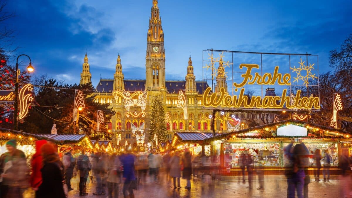 Rathaus and christmas market in Vienna, Austria Translation: Merry Christmas