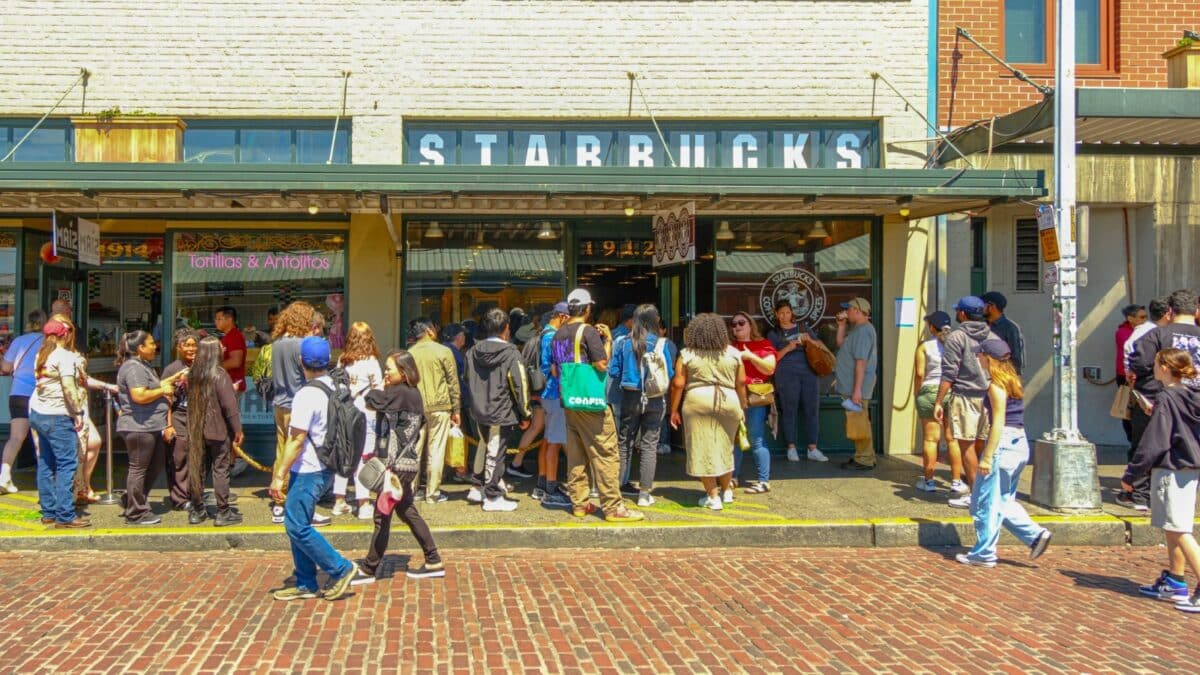 SEATTLE, WASHINGTON - July 3, 2023: Pike Place Market is a public market overlooking the Elliott Bay waterfront in Seattle, Washington. The Market opened in 1907.